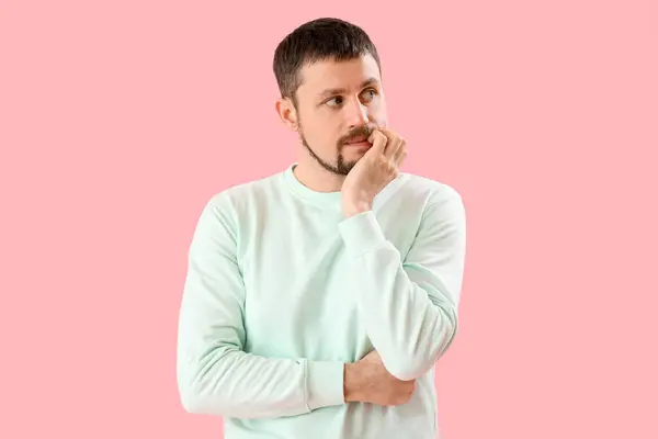 Handsome Man Biting Nails Pink Background — Stock Photo, Image