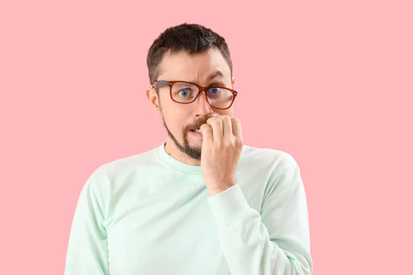 Handsome Man Eyeglasses Biting Nails Pink Background — Stock Photo, Image