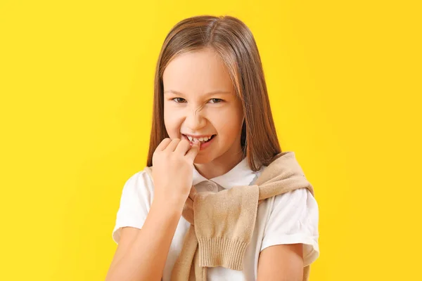 Little Girl Biting Nails Yellow Background Closeup — Stock Photo, Image