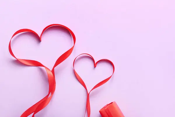 Hearts Made Red Ribbon Lilac Background Valentine Day Celebration — Stock Fotó