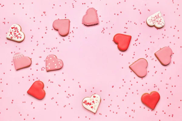 Frame Made Tasty Heart Shaped Cookies Sprinkles Pink Background — 스톡 사진