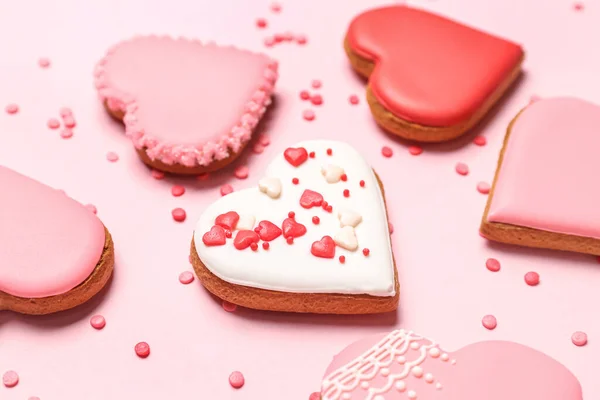 Composition Tasty Heart Shaped Cookies Colorful Sprinkles Pink Background Closeup — Stockfoto