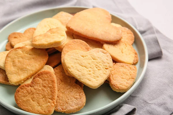 Plate of sweet heart shaped cookies, closeup. Valentines Day celebration
