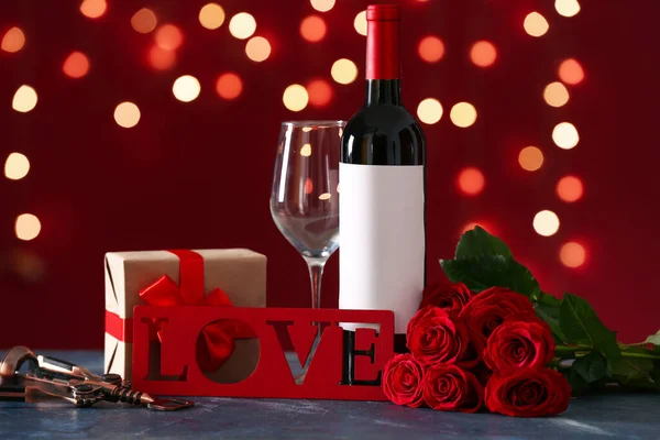 Bottle Wine Rose Flowers Gift Text Love Black Table Blurred — Stockfoto