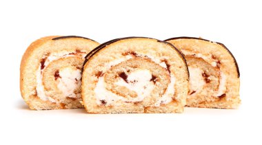 Pieces of tasty sponge cake roll isolated on white background