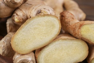 Texture of fresh ginger roots as background