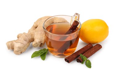 Ginger root, cup of black tea, cinnamon and lemon isolated on white background