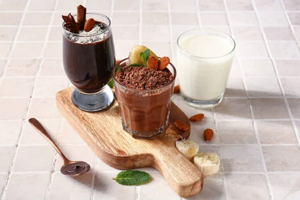 Board Glasses Delicious Chocolate Pudding Cinnamon Almond Milk Tile Table — Stock Photo, Image
