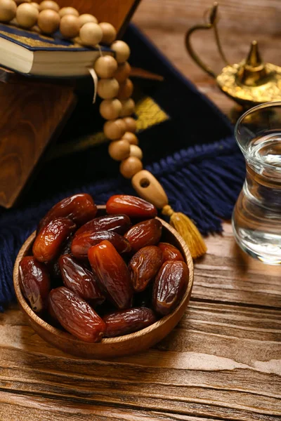 Bowl Dried Dates Prayer Beads Koran Ramadan Wooden Table Closeup — Stock Photo, Image