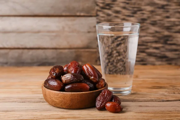 Bowl Dried Dates Glass Water Ramadan Wooden Table — Stock Photo, Image