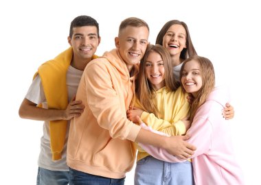 Group of happy friends hugging on white background