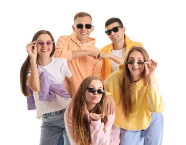 Group of happy friends in sunglasses on white background
