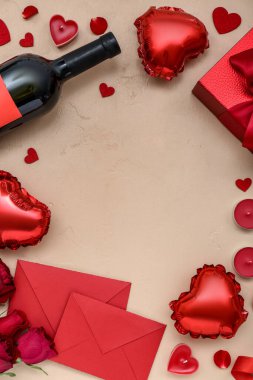 Frame made of balloons, envelopes and candles on color background. Valentine's Day celebration