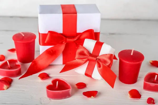 Candles Gift Boxes Rose Petals Light Wooden Table Valentine Day — Stock Photo, Image