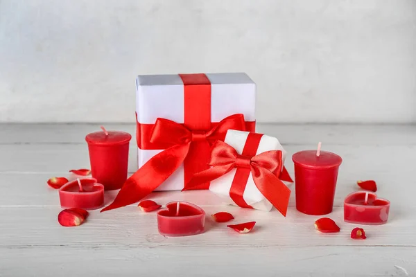 Candles Gift Boxes Rose Petals Light Wooden Table Valentine Day — Fotografia de Stock