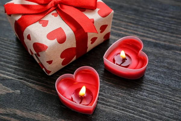 Burning Candles Gift Box Wooden Background Closeup Valentine Day Celebration — Foto de Stock