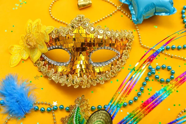 Carnival Mask Beads Confetti Yellow Background — Stock Photo, Image