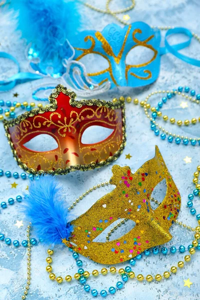 Carnival masks with beads on grunge background