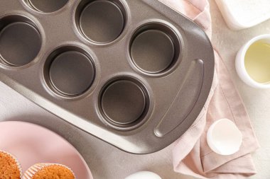 Muffin tray on light table, closeup