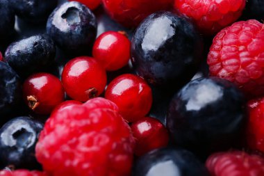 Heap of fresh tasty berries, closeup