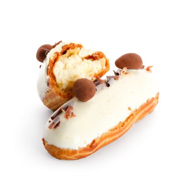 Tasty eclairs on isolated white background