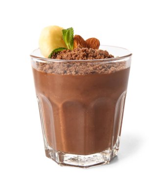 Glass of chocolate pudding with almond, mint and banana slice isolated on white background