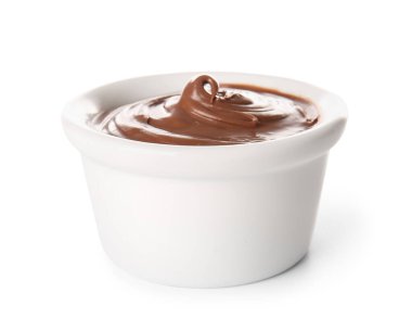 Bowl of delicious chocolate pudding isolated on white background
