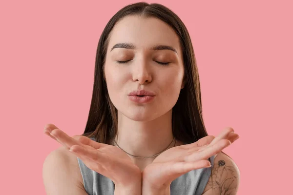 Young Woman Blowing Kiss Pink Background Closeup — Foto Stock