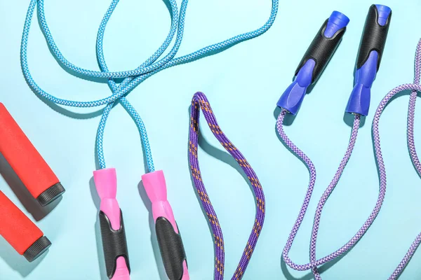 Skipping ropes on blue background