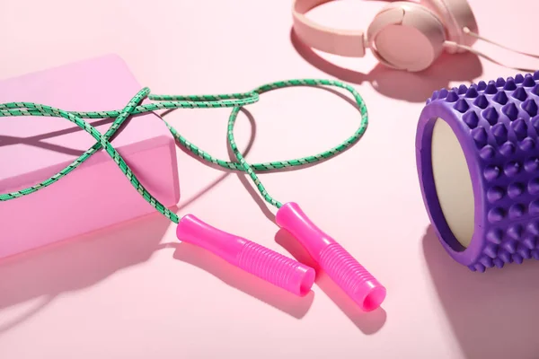 Skipping Rope Block Foam Roller Headphones Pink Background Closeup — Stock Photo, Image