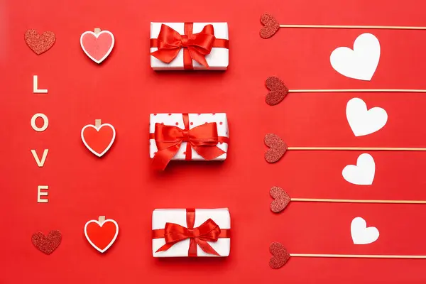 Gift Boxes Beautiful Bows Hearts Word Love Red Background Valentine — Φωτογραφία Αρχείου