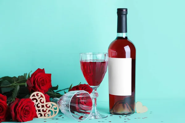 Glass Wine Bottle Rose Flowers Turquoise Background Valentine Day Celebration — Zdjęcie stockowe