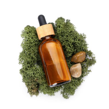 Cosmetic dropper bottle, pebbles and green moss on white background
