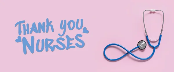 Text THANK YOU NURSES with stethoscope on pink background