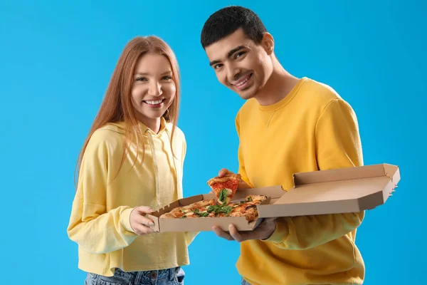 Young Couple Box Tasty Pizza Blue Background — Stock Photo, Image
