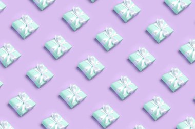 Many gifts on lilac background. Pattern for design