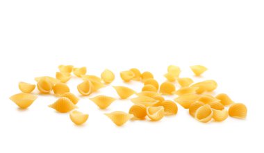 Raw conchiglioni pasta isolated on white background