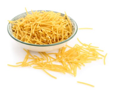 Bowl of raw vermicelli pasta on white background