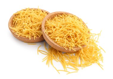 Plates of raw vermicelli pasta on white background