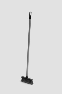 Sweeping broom on white background