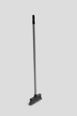 Sweeping broom on white background