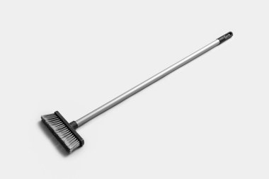 Sweeping broom on white background