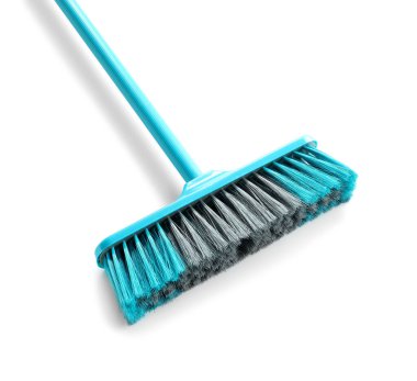 Broom for cleaning isolated on white background, closeup