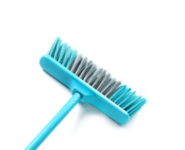 Broom for cleaning isolated on white background, closeup