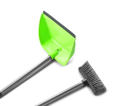 Broom and dustpan for cleaning isolated on white background