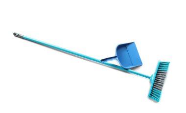 Blue dustpan and broom on white background