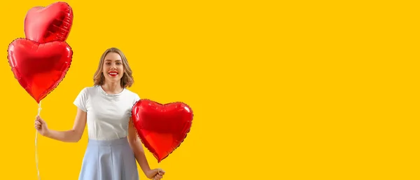 Beautiful Young Woman Heart Shaped Balloons Yellow Background Space Text — Foto Stock