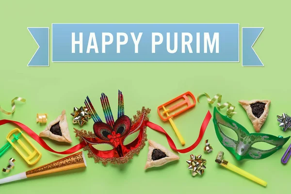 Beautiful greeting card for Purim holiday with carnival masks and rattles on green background