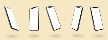 Set of mobile phones with blank screens on beige background
