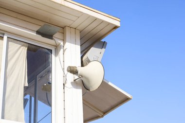 View of lifeguard house against blue sky, closeup